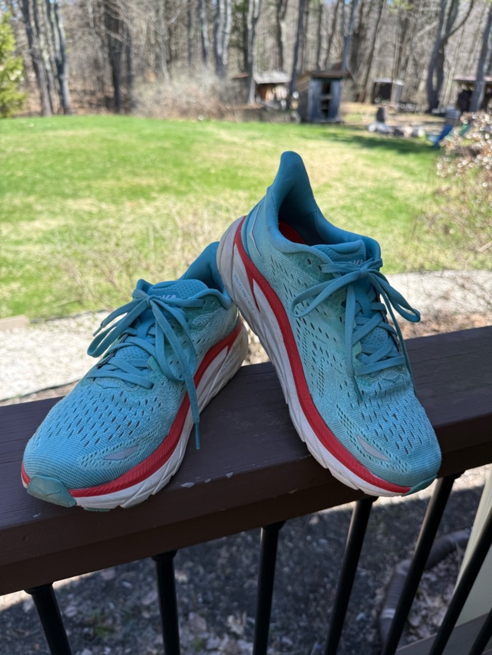 Hoka One One Aqua Teal and Coral Running Shoe.